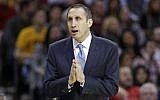 Cleveland Cavaliers head coach David Blatt talks to a referee during an NBA basketball game against the Indiana Pacers in Cleveland. (photo credit: AP Photo/Tony Dejak, File)