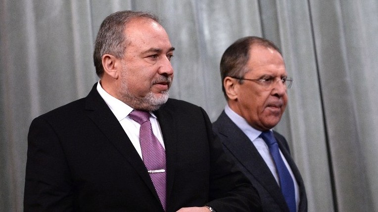 Illustrative: Then-Foreign Minister Avigdor Liberman (left) and Russian Foreign Minister Sergey Lavrov (right) arrive for a joint press conference following their meeting in Moscow on January 26, 2015. (photo credit: AFP/Vasily Maximov) Illustrative: Then-Foreign Minister Avigdor Liberman (left) and Russian Foreign Minister Sergey Lavrov (right) arrive for a joint press conference following their meeting in Moscow on January 26, 2015. (photo credit: AFP/Vasily Maximov)