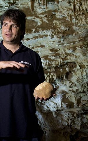 Dr. Omry Barzilai of the Israel Antiquities Authority near the site of an ancient skull fragment's discovery in the Manot Cave (photo credit: Judah Ari Gross/Times of Israel staff) Dr. Omry Barzilai of the Israel Antiquities Authority near the site of an ancient skull fragment's discovery in the Manot Cave (photo credit: Judah Ari Gross/Times of Israel staff)