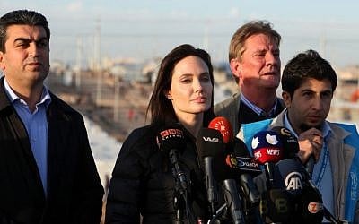 Special Envoy of the United Nations High Commissioner for Refugees (UNHCR), Angelina Jolie delivers a speech during a press conference in Khanke camp in Dahuk, north of the Kurdistan region, 260 miles (430 kilometers) northwest of Baghdad, Iraq, Sunday, Jan. 25, 2015.  (Photo credit: AP/Seivan M. Selim)