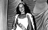 In this Sept. 8, 1945 file photo, Bess Myerson, of New York, holds the scepter after being crowned Miss America 1945 at the annual Miss America pageant in Atlantic City, N.J. (photo credit: AP)