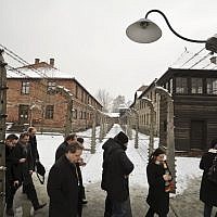 Visitors walk by barbed wire fences at the Auschwitz Nazi death camp in Oswiecim, Poland, Monday, Jan. 26, 2015 (AP Photo/Alik Keplicz) Visitors walk by barbed wire fences at the Auschwitz Nazi death camp in Oswiecim, Poland, Monday, Jan. 26, 2015 (AP Photo/Alik Keplicz)