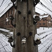 Barbed wire fences surround detention buildings at the Auschwitz Nazi death camp in Oswiecim, Poland, Monday, Jan. 26, 2015 (AP Photo/Alik Keplicz) Barbed wire fences surround detention buildings at the Auschwitz Nazi death camp in Oswiecim, Poland, Monday, Jan. 26, 2015 (AP Photo/Alik Keplicz)