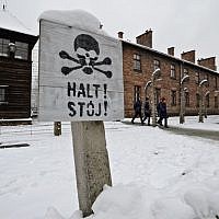 Visitors at the Auschwitz Nazi death camp in Oswiecim, Poland, January 26, 2015 (AP/Alik Keplicz) Visitors at the Auschwitz Nazi death camp in Oswiecim, Poland, January 26, 2015 (AP/Alik Keplicz)