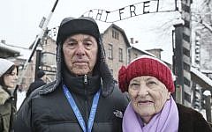 Rose Schindler, 85 (right), a survivor of Auschwitz, and her husband, Max, 85 (left), visit the former death camp in Oswiecim, Poland, on January 26, 2015 (photo credit: AP/Czarek Sokolowski)