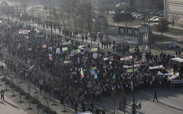 Chechen Muslims march in downtown regional capital of Grozny to take part in a protest rally on Monday, January 19, 2015. (photo credit: AP Photo/Musa Sadulayev) Chechen Muslims march in downtown regional capital of Grozny to take part in a protest rally on Monday, January 19, 2015. (photo credit: AP Photo/Musa Sadulayev)