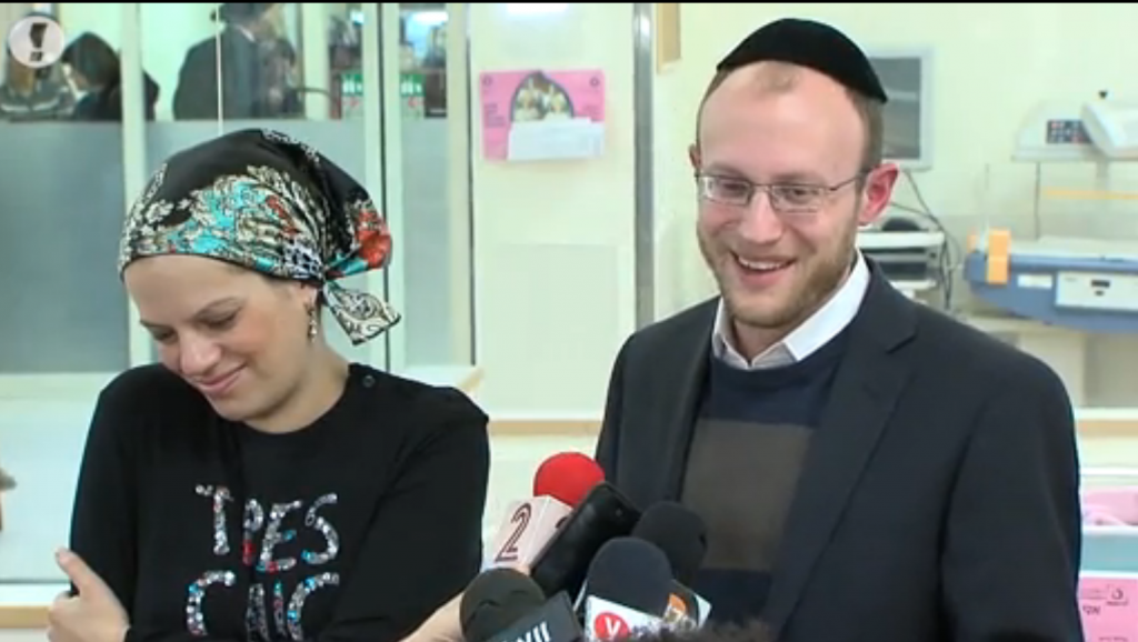Shimon and Michal Gross speak to the press after the birth of their son, nearly a year after their two daughters died in a poisoning accident. (screen capture: Walla news)