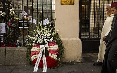 A funeral wreath left by members of the Islamic community of Madrid outside the French Embassy of Madrid in support of the Paris victims of jihadist terror attacks, Madrid, Spain, Sunday, Jan. 11, 2015.  (photo credit: AP/Andres Kudacki)