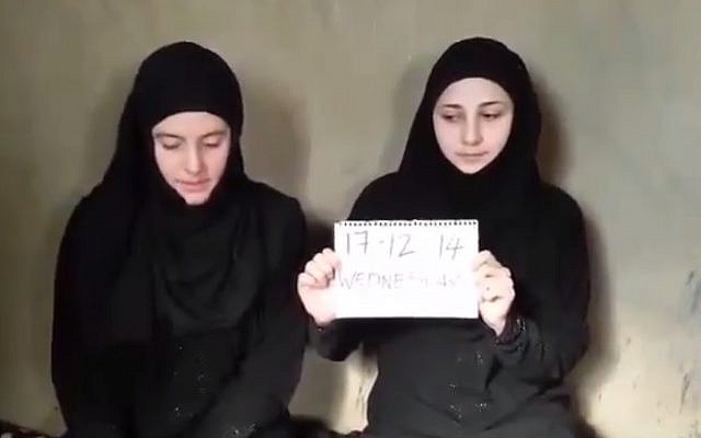 An image from a video purportedly of Italian aid workers Greta Ramelli and Vanessa Marzullo, who were abducted in August (photo credit: YouTube screenshot)