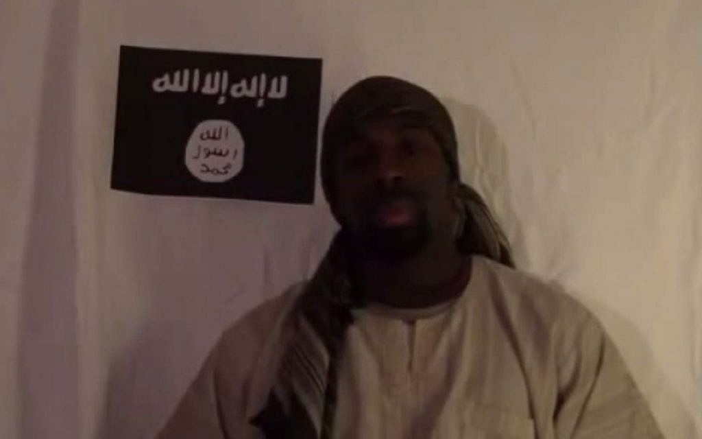 Amedy Coulibaly, who was shot dead by French police after he killed four French Jews in a kosher store on January 9, 2015, is seen in a video clip pledging allegiance to the Islamic State. (YouTube screenshot) Amedy Coulibaly, who was shot dead by French police after he killed four French Jews in a kosher store on January 9, 2015, is seen in a video clip pledging allegiance to the Islamic State. (YouTube screenshot)