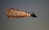An illustrative photo of an Israel Air Force Apache helicopter, taken on December 25, 2014 at Hatzerim Air Base in Israel ( AP Photo/ Tsafrir Abayov)
