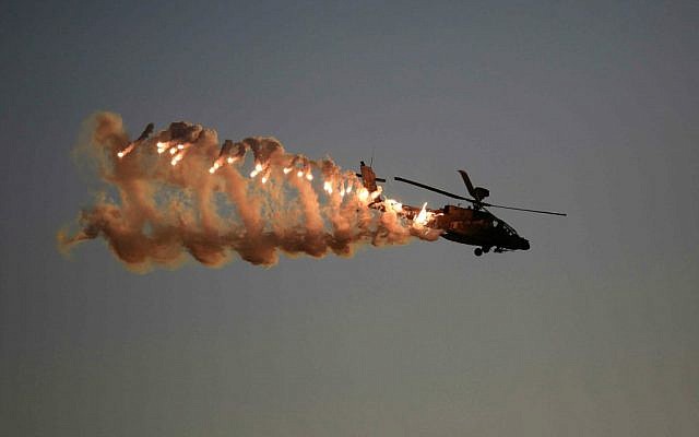 An illustrative photo of an Israel Air Force Apache helicopter, taken on December 25, 2014 at Hatzerim Air Base in Israel (photo credit: AP Photo/ Tsafrir Abayov) An illustrative photo of an Israel Air Force Apache helicopter, taken on December 25, 2014 at Hatzerim Air Base in Israel (photo credit: AP Photo/ Tsafrir Abayov)