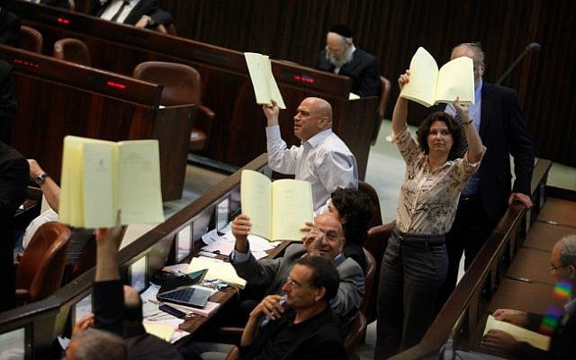 MKs form Balad and Hadash during a plenum session voting on the state budget, in the Knesset, Jerusalem, July 29, 2013 (photo credit: Flash90) MKs form Balad and Hadash during a plenum session voting on the state budget, in the Knesset, Jerusalem, July 29, 2013 (photo credit: Flash90)