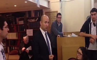 Economics Minister Naftali Bennett speaks to French youths in Paris on January 11, 2015. (screen capture: Channel 2)