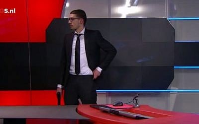 An armed man entered Dutch national broadcaster NOS demanding airtime, on January 29, 2015 (photo credit: YouTube screen capture) An armed man entered Dutch national broadcaster NOS demanding airtime, on January 29, 2015 (photo credit: YouTube screen capture)