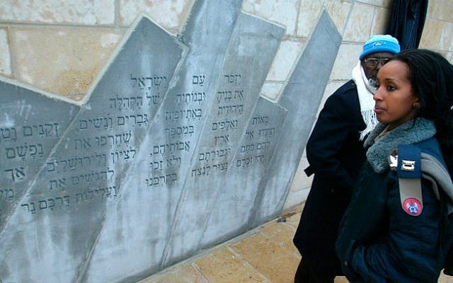 An Israel Air Force officer alongside the monument to Ethiopian Jews who died on the way to Zion, in a photo taken on March 14, 2007 (photo credit: Olivier Fitoussi/ Flash 90/ Israeli pool)