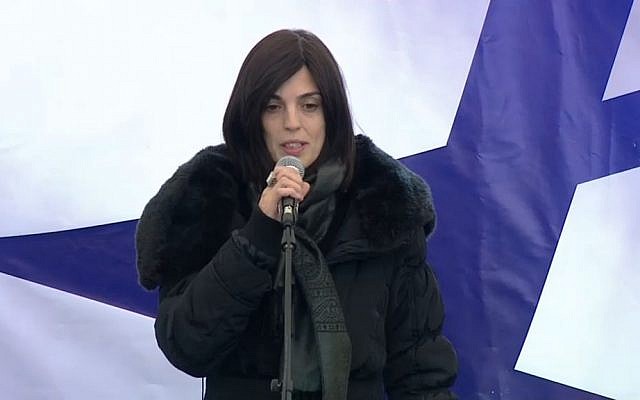 Valery Braham, widow of Philippe Braham, who was killed along with three other Jewish men in an attack in Paris, eulogizes her late husband during his funeral in Jerusalem on Tuesday, January 13, 2015 (screen capture) 