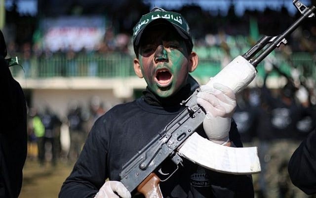 A Palestinian youth holds a weapon during a graduation ceremony as part of a training camp run by the Hamas movement on January 29, 2015 in Khan Yunis, in the southern Gaza Strip. (AFP photo/Said Khatib) A Palestinian youth holds a weapon during a graduation ceremony as part of a training camp run by the Hamas movement on January 29, 2015 in Khan Yunis, in the southern Gaza Strip. (AFP photo/Said Khatib)
