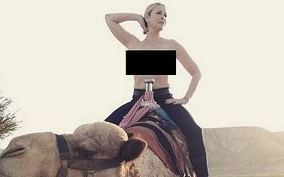 Handler writes on January 29, 2014, 'A Muslim allowed a topless Jew to sit on his camel. And we say we can't live side by side?' Perhaps peace is right around the corner. (Screen capture: Facebook)