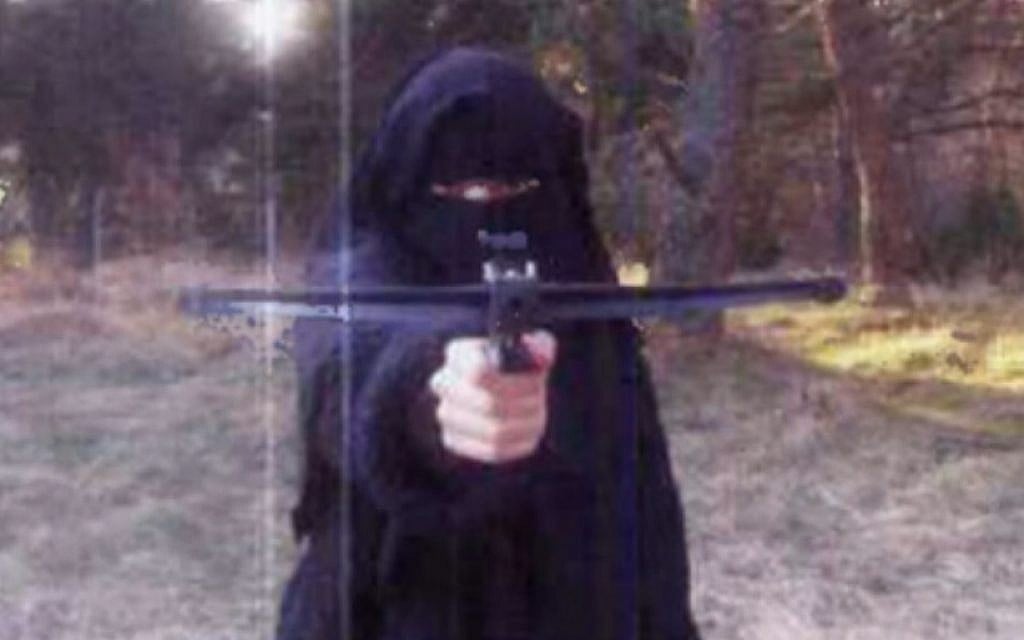 In this undated picture, Hayat Boumedienne, is seen holding what appears to be a crossbow. (Photo screenshot: Itele)
