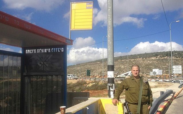 Maj. Irad Hershkovitz at Rechelim Junction, the site of several IED attacks this year (photo credit: Mitch Ginsburg/ Times of Israel)