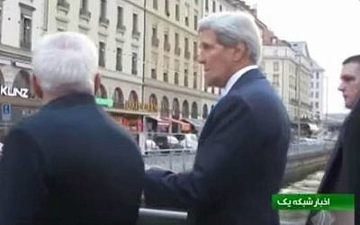 A screen capture of US Secretary of State John Kerry and Iranian Foreign Minister Mohammad Javad Zarif walking through Geneva, Switzerland during P5+1 talks on January 14, 2015. (screen capture: YouTube)