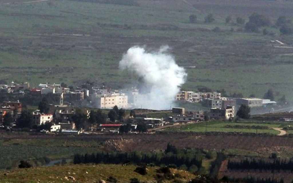 Smoke from Israeli shelling billow from the Lebanese town of Al-Majidiyah on the Lebanese border with Israel on January 28, 2015. Lebanese Shiite militant group Hezbollah claimed responsibility on Wednesday for an attack against an Israeli military convoy near the border. (Photo credit: AFP/ ALI DIA)