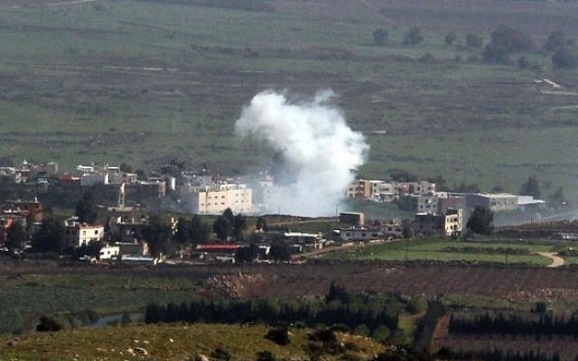 Smoke from Israeli shelling billow from the Lebanese town of Al-Majidiyah on the Lebanese border with Israel on January 28, 2015. Lebanese Shiite militant group Hezbollah claimed responsibility on Wednesday for an attack against an Israeli military convoy near the border. (Photo credit: AFP/ ALI DIA) Smoke from Israeli shelling billow from the Lebanese town of Al-Majidiyah on the Lebanese border with Israel on January 28, 2015. Lebanese Shiite militant group Hezbollah claimed responsibility on Wednesday for an attack against an Israeli military convoy near the border. (Photo credit: AFP/ ALI DIA)