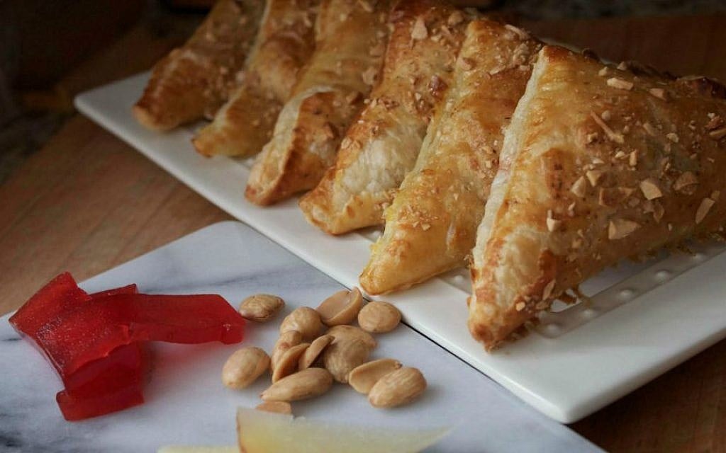 These Spanish-inspired Manchego and Quince turnovers are a sort of savory Cuban boureka. (Jennifer Stempel/via JTA) These Spanish-inspired Manchego and Quince turnovers are a sort of savory Cuban boureka. (Jennifer Stempel/via JTA)