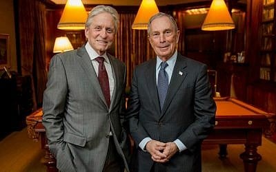 Michael Douglas, left, with Michael Bloomberg, last year's recipient of the Genesis Prize. (Courtesy Genesis Prize)