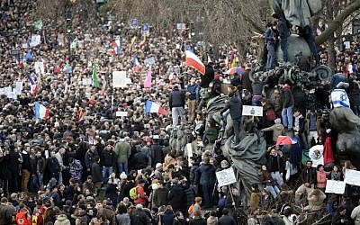 People take part in the unity rally on January 11, 2015 in Paris in tribute to the 17 victims of a three-day killing spree by homegrown Islamists (photo credit: AFP/ MARTIN BUREAU)