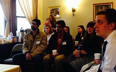 Jewish student leaders listen to a talk given by Israeli Chief Rabbi David Lau at the University of Southern California’s Chabad House on January 11, 2015. (Kelly Hartog/The Times of Israel)