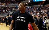 Washington Wizards center Kevin Seraphin, from France, wears a 'Je Suis Charlie' T-shirt during warmups for an NBA basketball game against the Chicago Bulls, Friday, Jan. 9, 2015, in Washington (photo credit: AP/Alex Brandon)