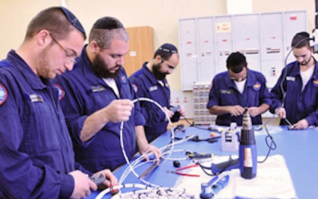 Members of the Shahar program work on a tech project (Courtesy: IAF) Members of the Shahar program work on a tech project (Courtesy: IAF)