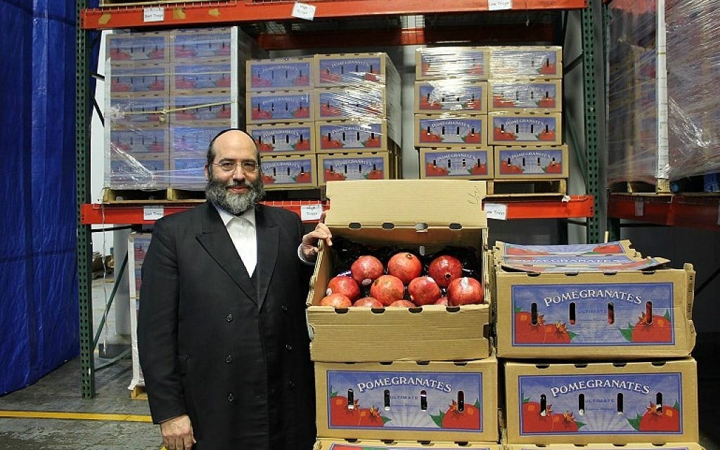 Rabbi Shulim Greenberg's organization, Chesed 24/7, receives a truckload of pomegranates each year donated from Pom Wonderful, the nation's largest pomegranate juice producer. (Uriel Heilman/JTA) Rabbi Shulim Greenberg's organization, Chesed 24/7, receives a truckload of pomegranates each year donated from Pom Wonderful, the nation's largest pomegranate juice producer. (Uriel Heilman/JTA)