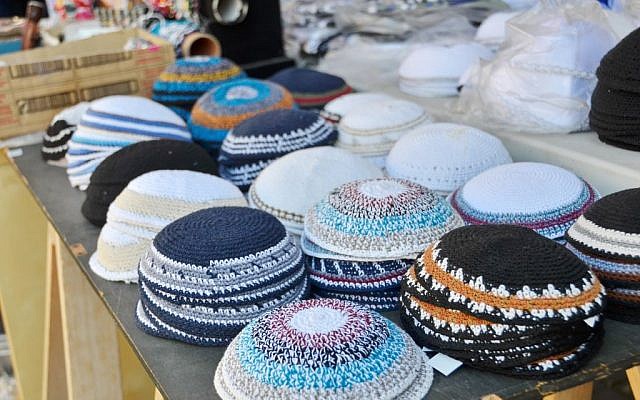 Yarmulkes for sale in Tel Aviv via Shutterstock.