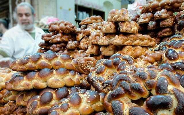 Challahs for sale at a market via Shutterstock.