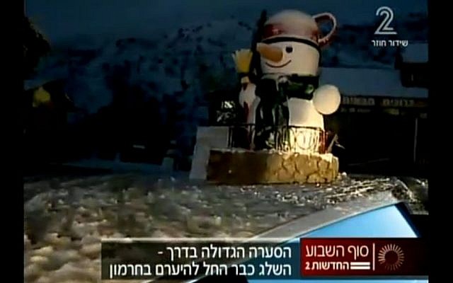 Snow on Mount Hermon on January 3, 2015. (screen capture: Channel 2) Snow on Mount Hermon on January 3, 2015. (screen capture: Channel 2)