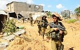 Infantry soldiers operating on the ground during Operation Protective Edge, July 20, 2014. (IDF Spokesperson's Unit/Flickr)