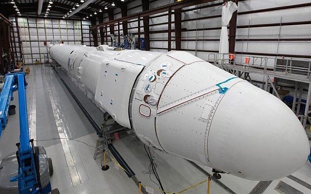 A SpaceX Falcon 9 and Dragon spacecraft ready for launch (Photo credit: Courtesy SpaceX) A SpaceX Falcon 9 and Dragon spacecraft ready for launch (Photo credit: Courtesy SpaceX)