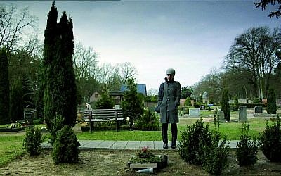 Israeli filmmaker Yael Reuveny, graveside in Europe, in the award-winning documentary 'Farewell Herr Schwarz.' (courtesy KinoLorber)