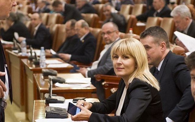 Elena Udrea, member of the Romanian Parliament assists at the working session of the Parliament to lift her parliamentary immunity in Bucharest February 9, 2015. (photo credit: Daniel Mihailescu/AFP) 