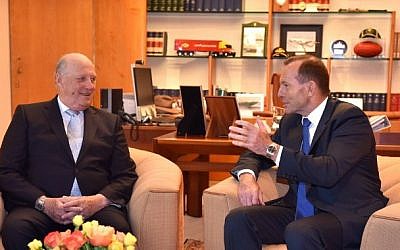 Norway's King Harald V (L) meets with Australia's Prime Minister Tony Abbott (R) during a visit to Parliament House in Canberra on February 23, 2015. King Harald V and Queen Sonja arrived in Canberra on February 22 along with other government and business leaders from Norway. (photo credit: AFP/POOL/MARK GRAHAM)