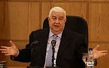 Syrian Deputy Prime Minister and Foreign Minister Walid Moallem speaks during a news conference with Minister of Foreign Affairs of Belarus Vladimir Makei in Damascus on February 9, 2015. (photo credit: AFP/LOUAI BESHARA)