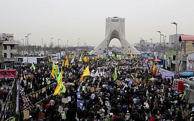 Iranians gather in Tehran's Azadi Square (Freedom Square) for a rally to mark the 36th anniversary of the Islamic revolution, February 11, 2015. (photo credit: AFP PHOTO / ATTA KENARE)
