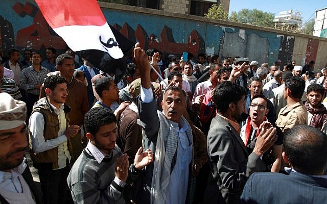 Yemenis shout slogans during a rally against the occupation of the capital by Shiite Houthi rebels on February 14, 2015 in the capital Sanaa. (photo credit: AFP/Mohammed Huwais) Yemenis shout slogans during a rally against the occupation of the capital by Shiite Houthi rebels on February 14, 2015 in the capital Sanaa. (photo credit: AFP/Mohammed Huwais)
