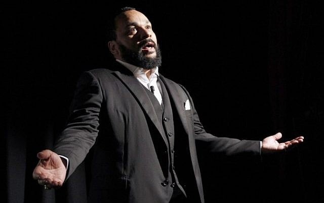 French comedian Dieudonne M’bala M’bala delivering a speech, January 15, 2012. (AFP/Patrick Kovarik) French comedian Dieudonne M’bala M’bala delivering a speech, January 15, 2012. (AFP/Patrick Kovarik)