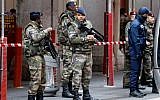 File: Soldiers stand guard outside the Jewish Community Center in Nice, France, February 3, 2015. (AFP Photo/Valery Hache)