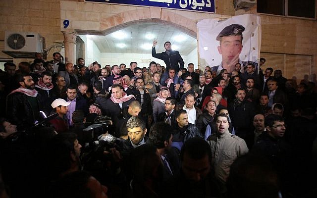 Supporters and family members of Jordanian pilot First Lieutenant Maoz al-Kasasbeh gather following his reported killing at the Karak tribal gathering chamber or Diwan, in the Jordanian capital Amman on February 3, 2015. (photo credit: AFP/STR) Supporters and family members of Jordanian pilot First Lieutenant Maoz al-Kasasbeh gather following his reported killing at the Karak tribal gathering chamber or Diwan, in the Jordanian capital Amman on February 3, 2015. (photo credit: AFP/STR)