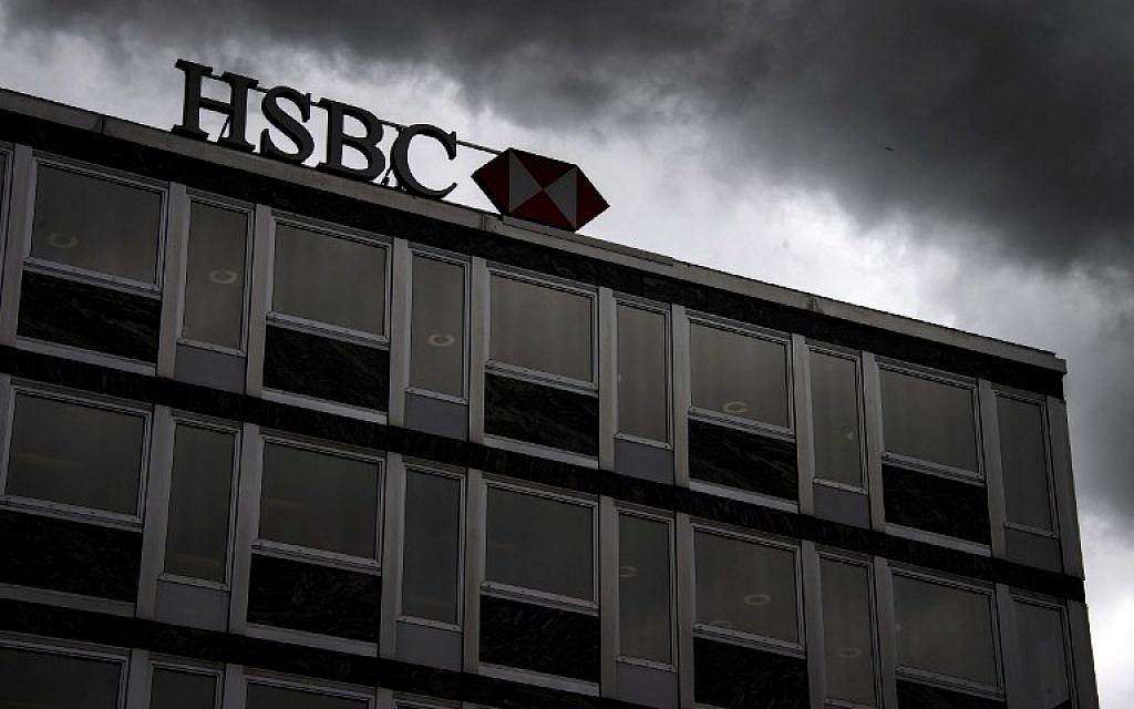 In this file picture taken on on June 14, 2013, clouds gather over a sign of HSBC private bank (Suisse) in the center of Geneva. (AFP/Fabrice Coffrini) In this file picture taken on on June 14, 2013, clouds gather over a sign of HSBC private bank (Suisse) in the center of Geneva. (AFP/Fabrice Coffrini)